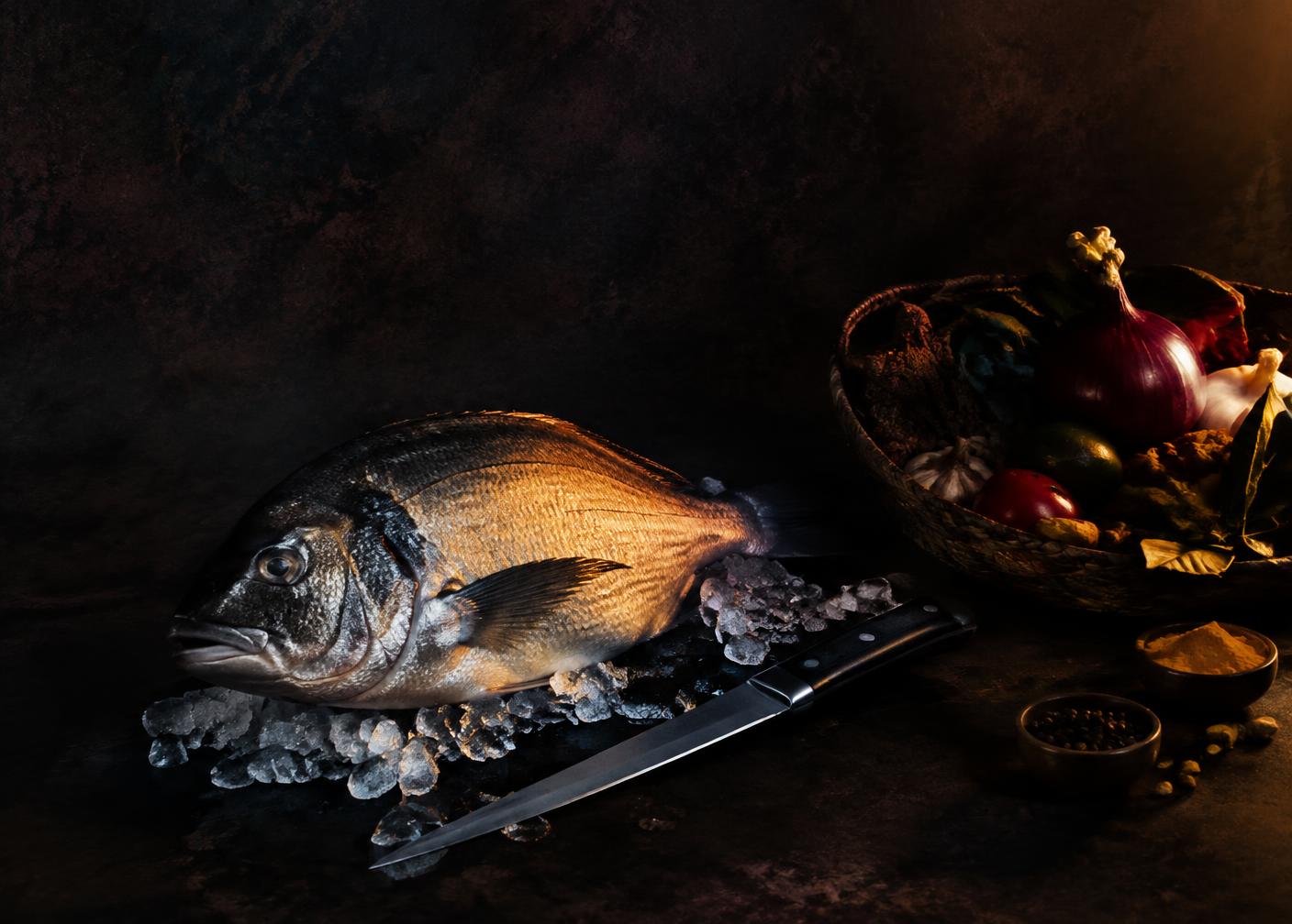 A whole round fish and a mystery basket of ingredients